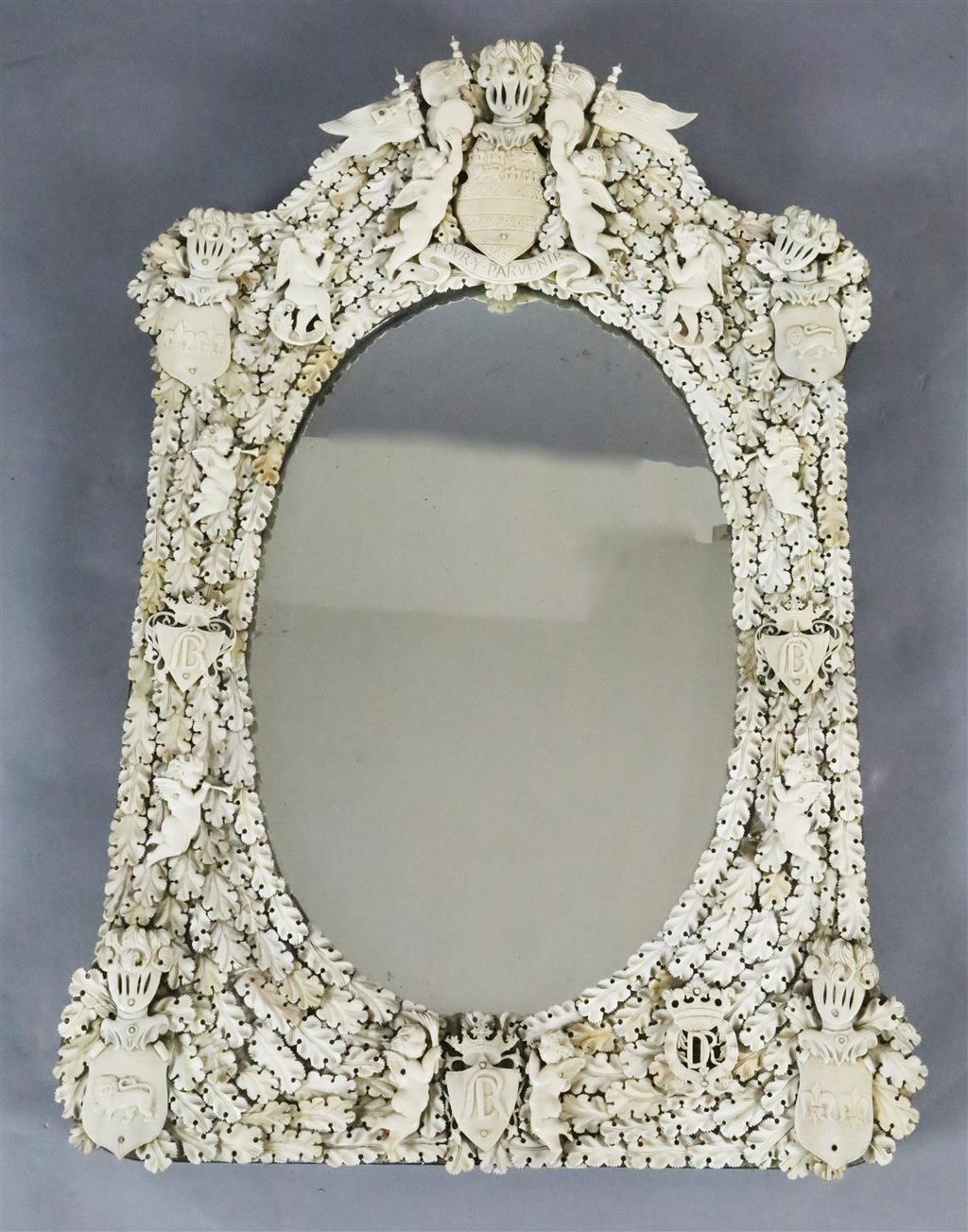 A 19th century Dieppe ivory wall mirror, W.1ft 10.5in. H.2ft 10in.